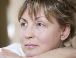 Closeup of a pensive middle aged woman; Shutterstock ID 149936549; PO: aol; Job: production; Client: drone